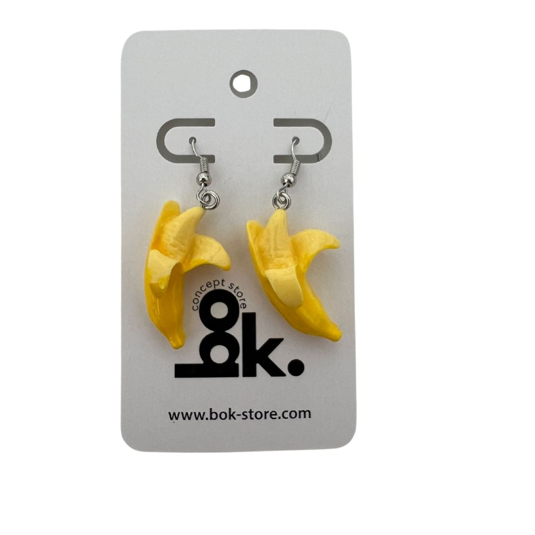 Aretes Freak Bananas: divertidos y originales aretes en forma de bananas amarillas, perfectos para un estilo fresco y ΓΊnico.