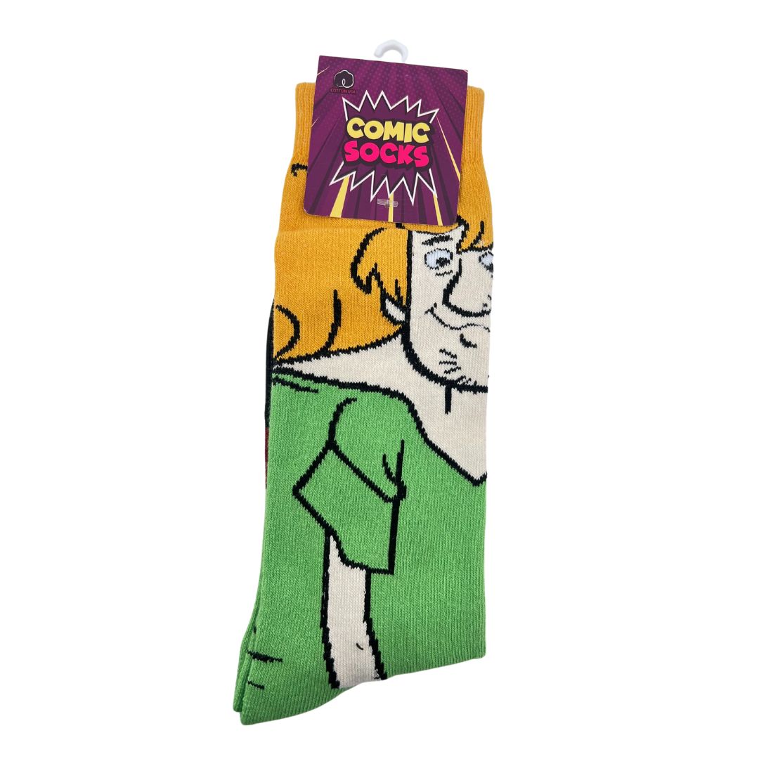 Medias largas verdes con un diseño inspirado en un personaje clásico de la animación, de Comic Socks, disponibles en BOK Concept Store. Comodidad, diversión y estilo en cada paso.