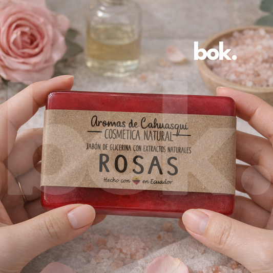 jabón de rosas sostenido por manos en fondo elegante con pétalos y sal estética minimal y consciente disponible en bok concept store ecuador