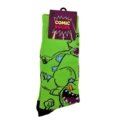 Medias Dino Reptar de Comic Socks disponibles en BOK Concept Store, diseño en verde intenso con la imagen del dinosaurio Reptar, largas, cómodas y perfectas para un look audaz.